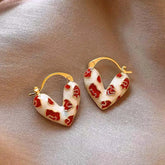 Bold Heart Pattern Gold Huggie Earrings by Freya Fabric